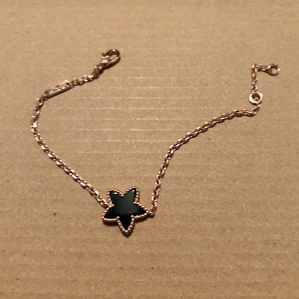 Rose gold black star bracelet. This is brand new stainless steel